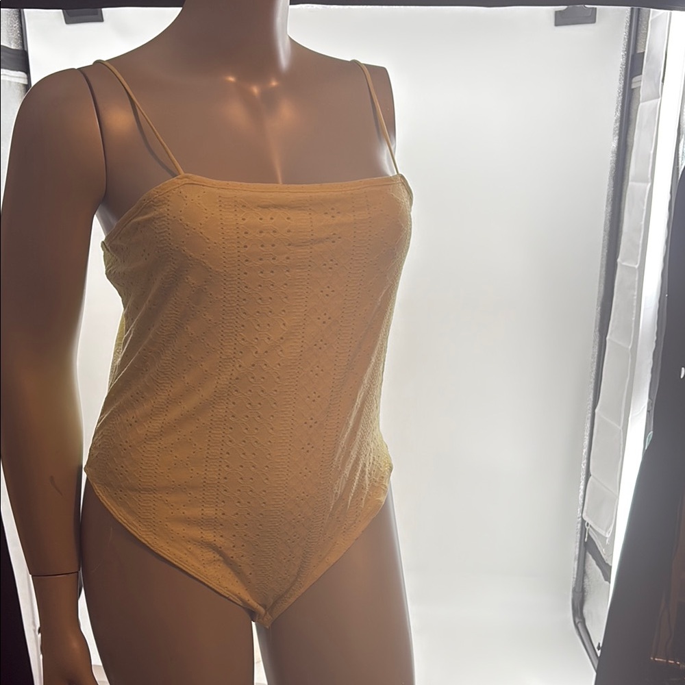 NWT. Rue21 Yellow Eyelet Bodysuit Size (2X)